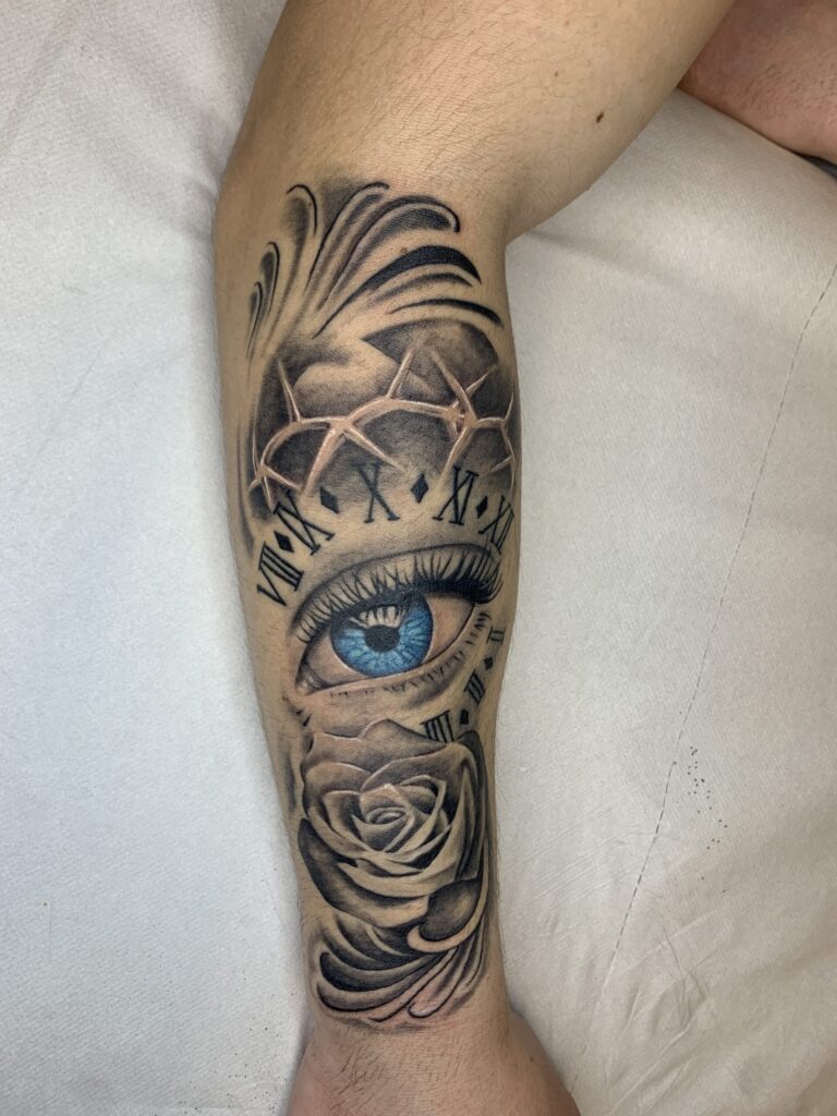 Tattoo Occhio Realistico Rosa Corona Spine Numeri Romani Avambraccio Longare